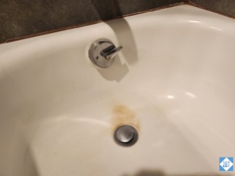 Rust stain in the tub in the master bath